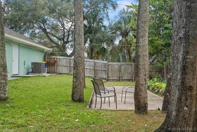 a view of a garden with a tree