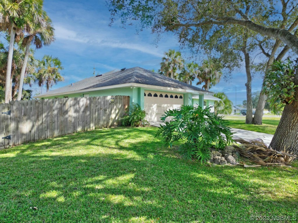 1829 Lime Tree Drive Edgewater, FL 32132 - Photo 47 of 62 a view of a back yard of the house