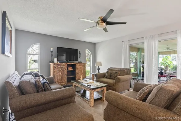 a living room with furniture and a couch