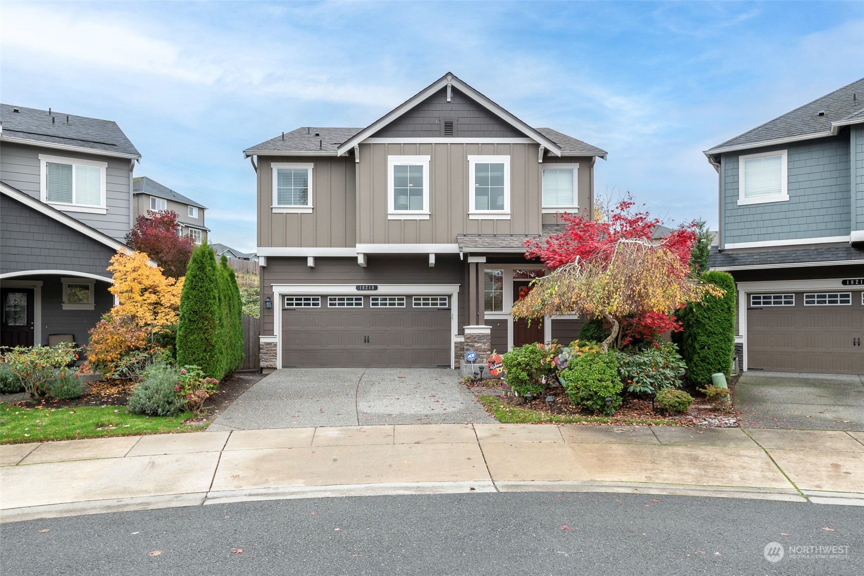 18219 41st Avenue Southeast Bothell, WA 98012 - Photo 1 of 1 a front view of house with yard and trees around