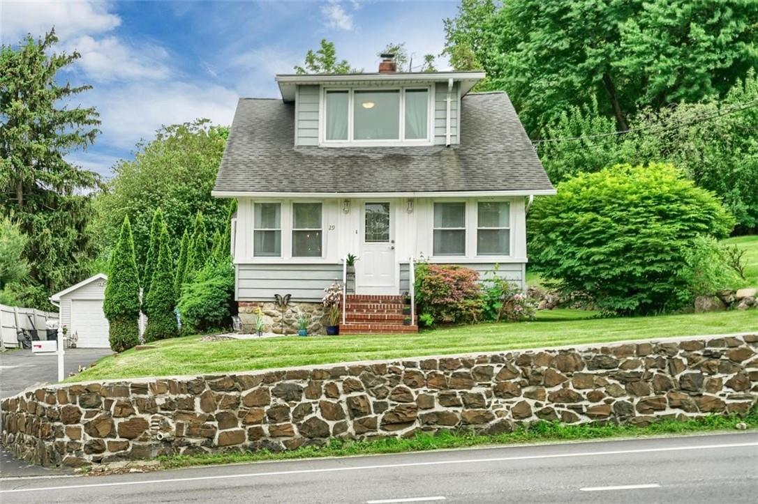 29 Ramapo Road Garnerville, NY 10923 - Photo 1 of 1 a front view of a house with garden