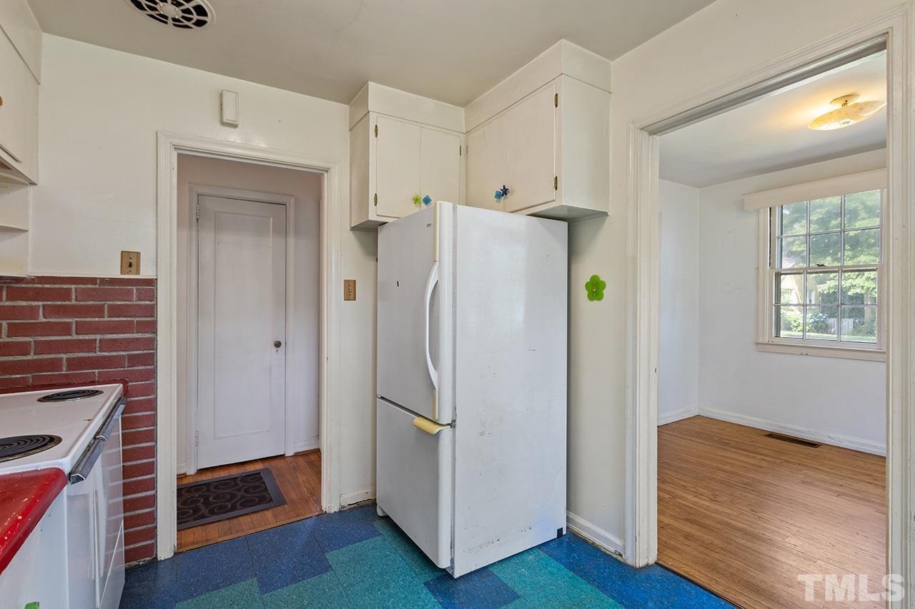 1208 Clifton Street Raleigh, NC 27604 - Photo 19 of 33 a white refrigerator freezer sitting inside of a kitchen