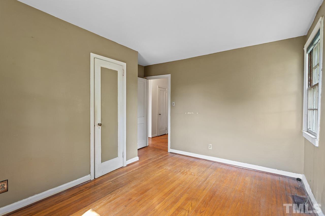 1208 Clifton Street Raleigh, NC 27604 - Photo 25 of 33 a view of empty room with wooden floor