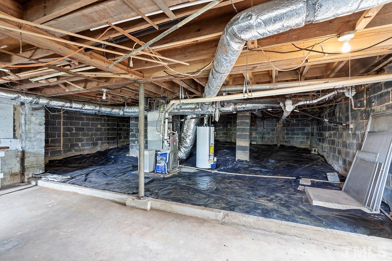 1208 Clifton Street Raleigh, NC 27604 - Photo 29 of 33 a view of a building with door