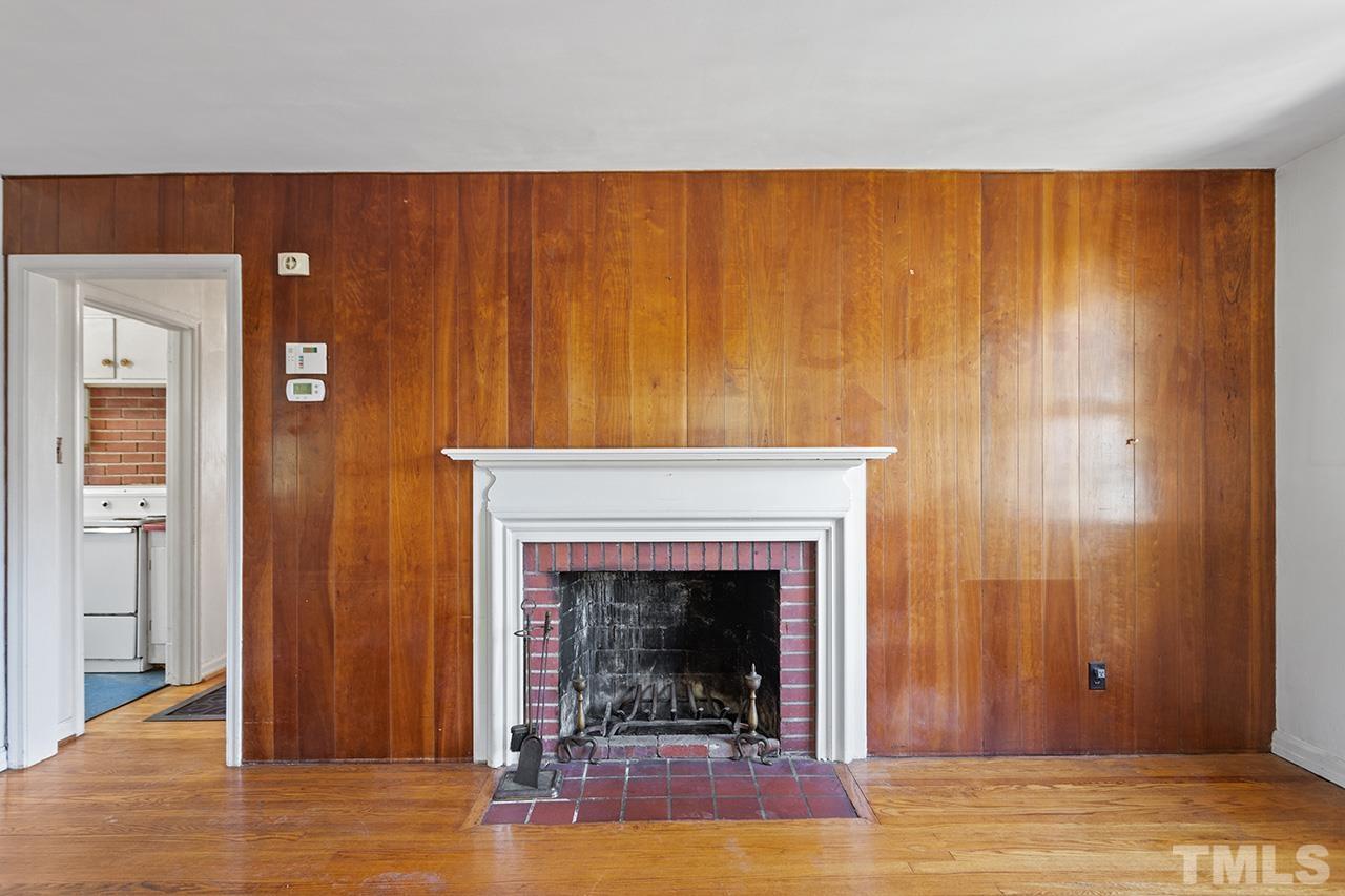 1208 Clifton Street Raleigh, NC 27604 - Photo 3 of 33 a view of a livingroom with a fireplace