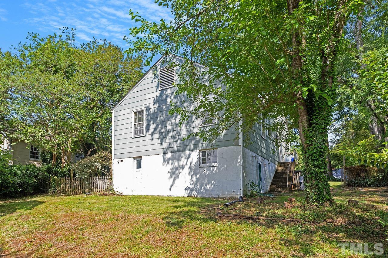 1208 Clifton Street Raleigh, NC 27604 - Photo 31 of 33 a house with a tree in front of it