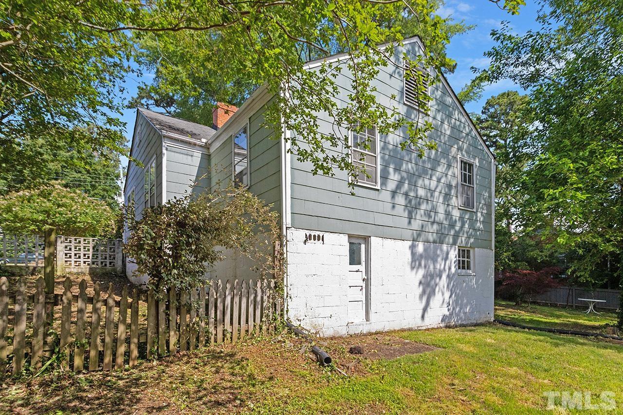 1208 Clifton Street Raleigh, NC 27604 - Photo 7 of 33 a front view of a house with a garden