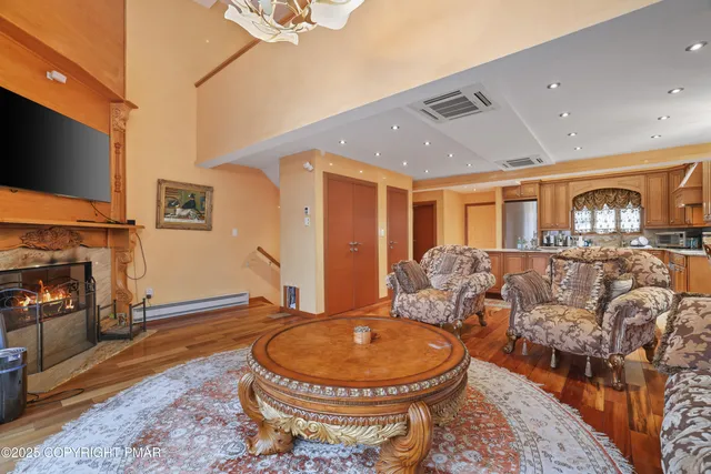 a view of a balcony with wooden floor
