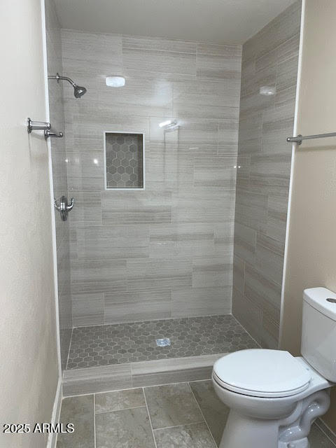 1827 East Kirkland Lane, Unit D Tempe, AZ 85288 - Photo 1 of 21 a bathroom with a toilet and a shower