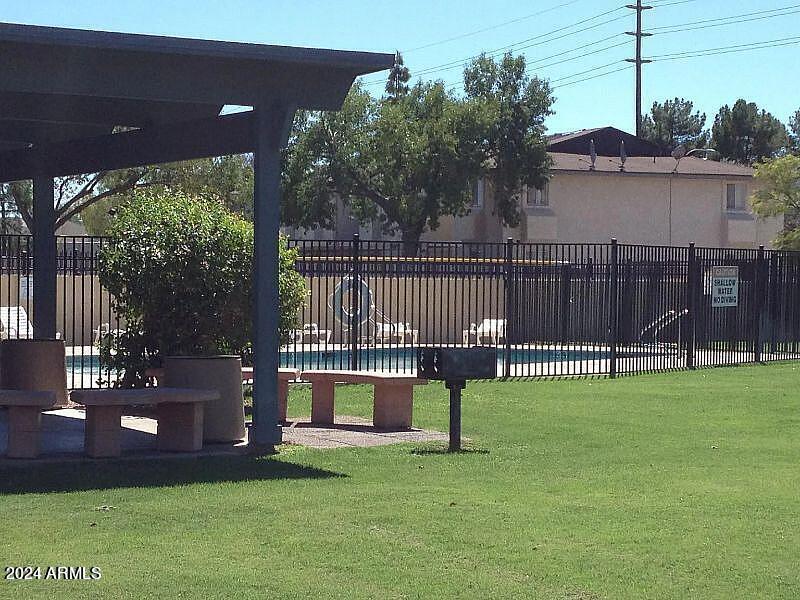 1827 East Kirkland Lane, Unit D Tempe, AZ 85288 - Photo 17 of 21 a view of a park with a slide