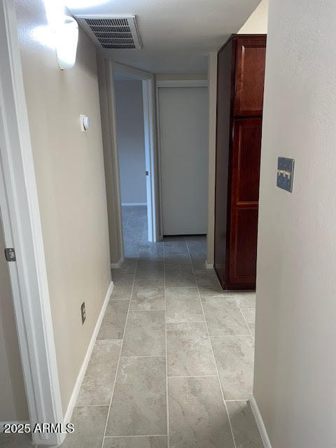 1827 East Kirkland Lane, Unit D Tempe, AZ 85288 - Photo 8 of 21 a view of a hallway