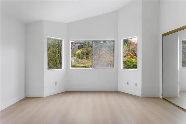 an empty room with windows