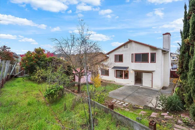 a view of a backyard with a garden