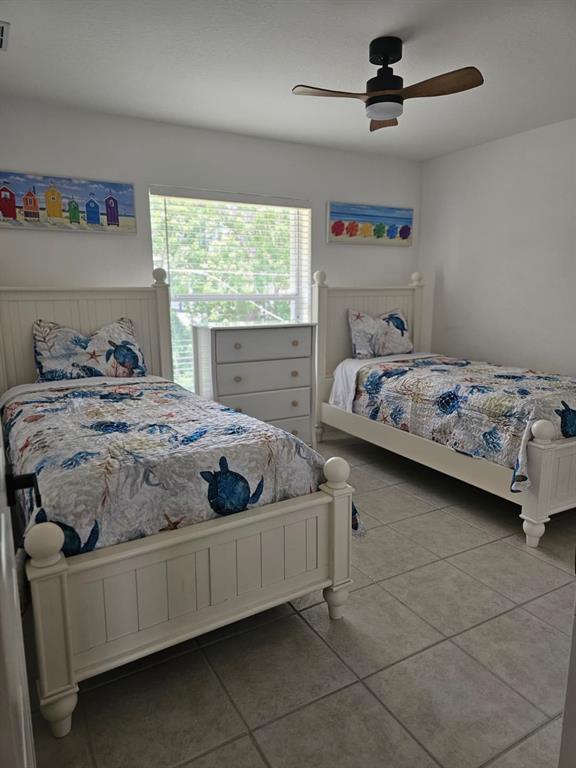 4472 Mariner Road Bonita Springs, FL 34134 - Photo 19 of 36 a bedroom with a bed and window