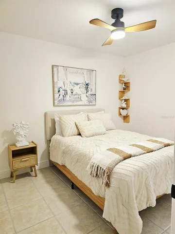 a kitchen with a sink a stove a refrigerator and cabinets