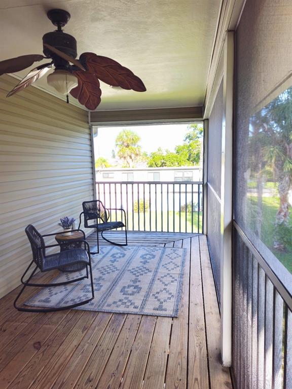 4472 Mariner Road Bonita Springs, FL 34134 - Photo 31 of 36 a view of two chairs in the balcony