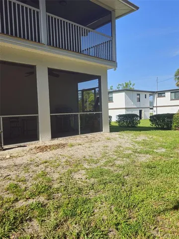 a view of a yard in front of the house