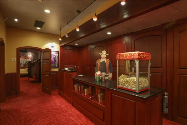 a patio with water table and chairs