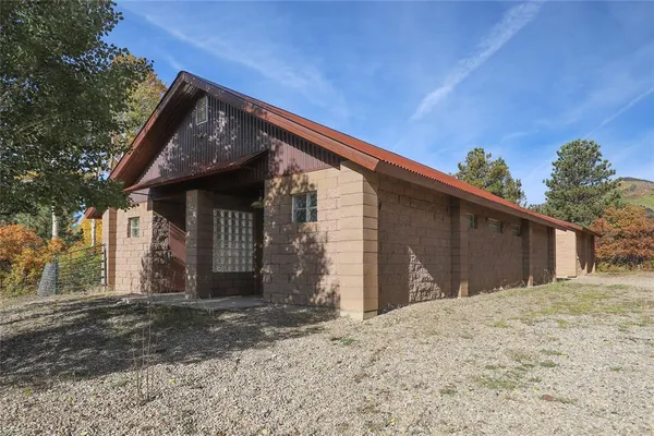 a view of a swimming pool with a porch