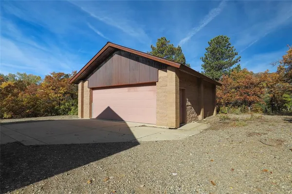 a kitchen with a stove and a microwave