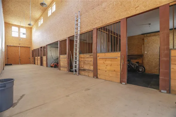 a view of a swimming pool with a yard