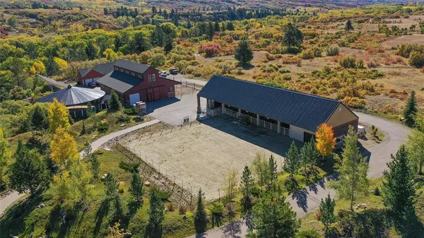a view of living room with furniture and fireplace