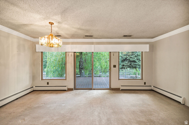1365 Sumac Drive Logan, UT 84321 - Photo 16 of 66 Spacious room featuring broadloom carpeting and light-toned walls