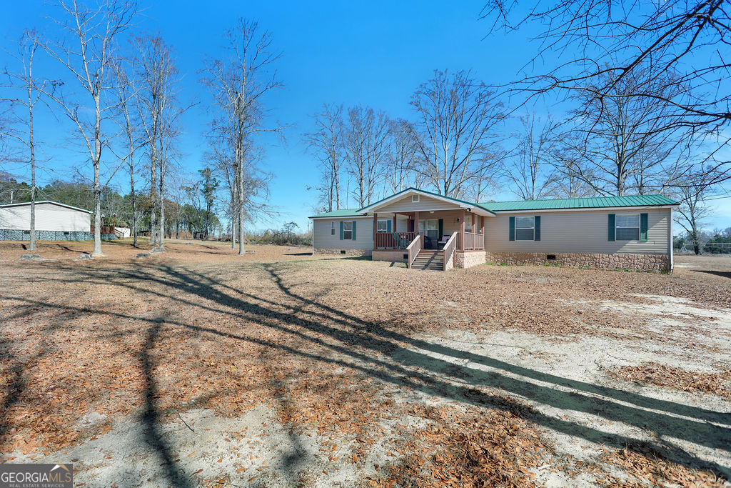 1775 Stoopto Road Sylvania, GA 30467 - Photo 50 of 66 a house view with a outdoor space