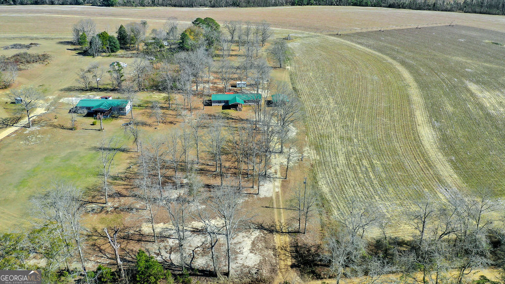 1775 Stoopto Road Sylvania, GA 30467 - Photo 59 of 66 a aerial view of residential houses with outdoor space