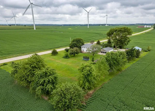 an aerial view of a house having yard