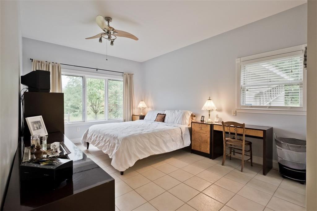 546 Upper Ridge Road Bridgton, ME 04009 - Photo 18 of 35 First floor master bedroom has an...
