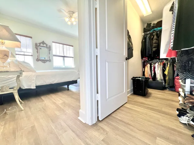 a view of living room with furniture and a flat screen tv