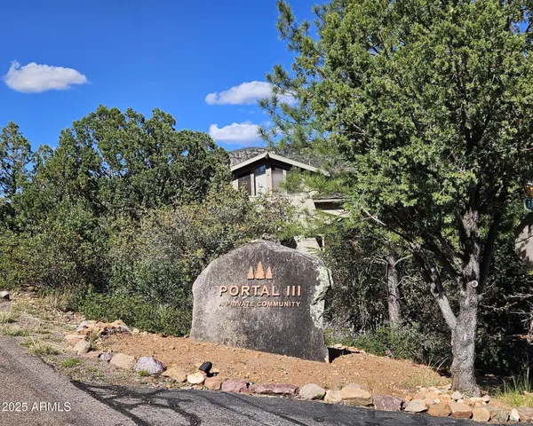 a view of a wooden fence