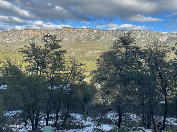 a view of a building covered with snow