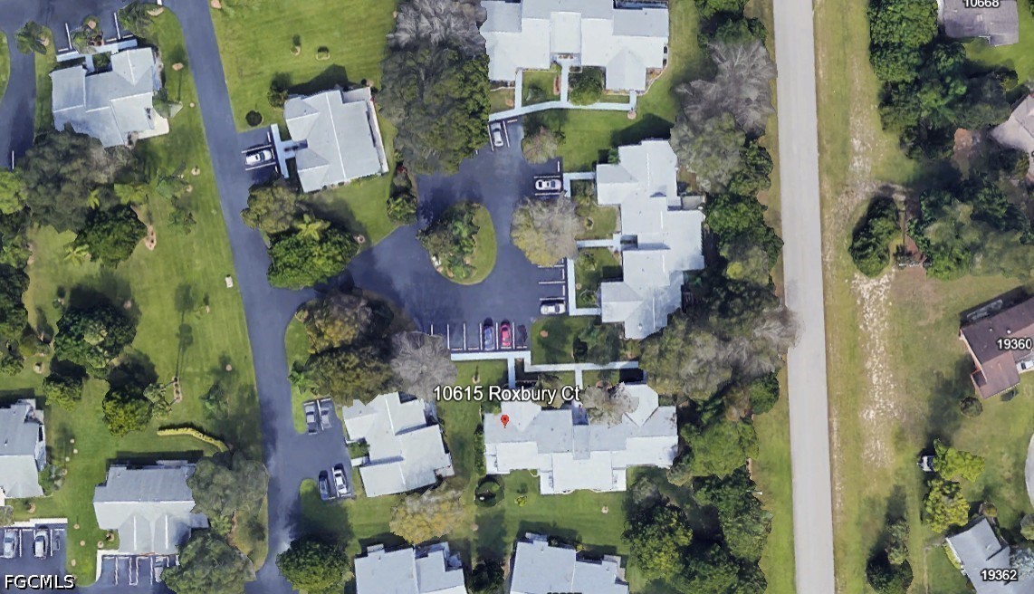 10615 Roxbury Court Lehigh Acres, FL 33936 - Photo 29 of 33 an aerial view of a house with outdoor space