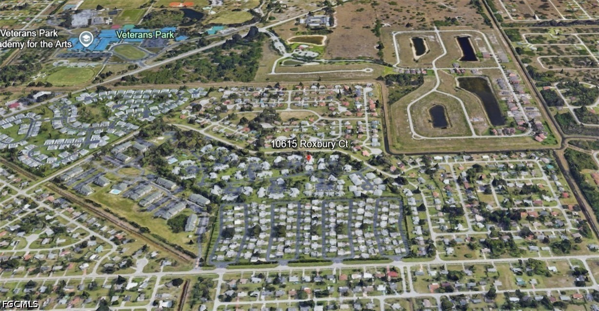 10615 Roxbury Court Lehigh Acres, FL 33936 - Photo 32 of 33 view of a mirror