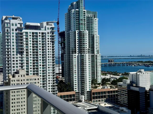 a view of a city with tall buildings