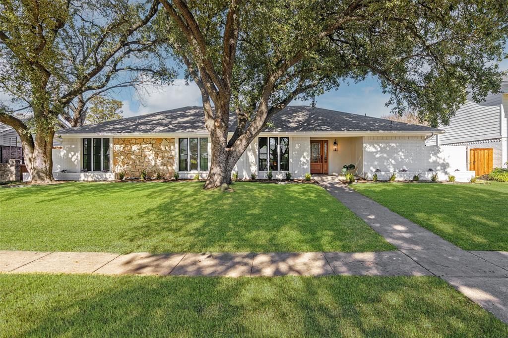 4023 High Summit Drive Dallas, TX 75244 - Photo 1 of 1 a front view of house with yard and green space
