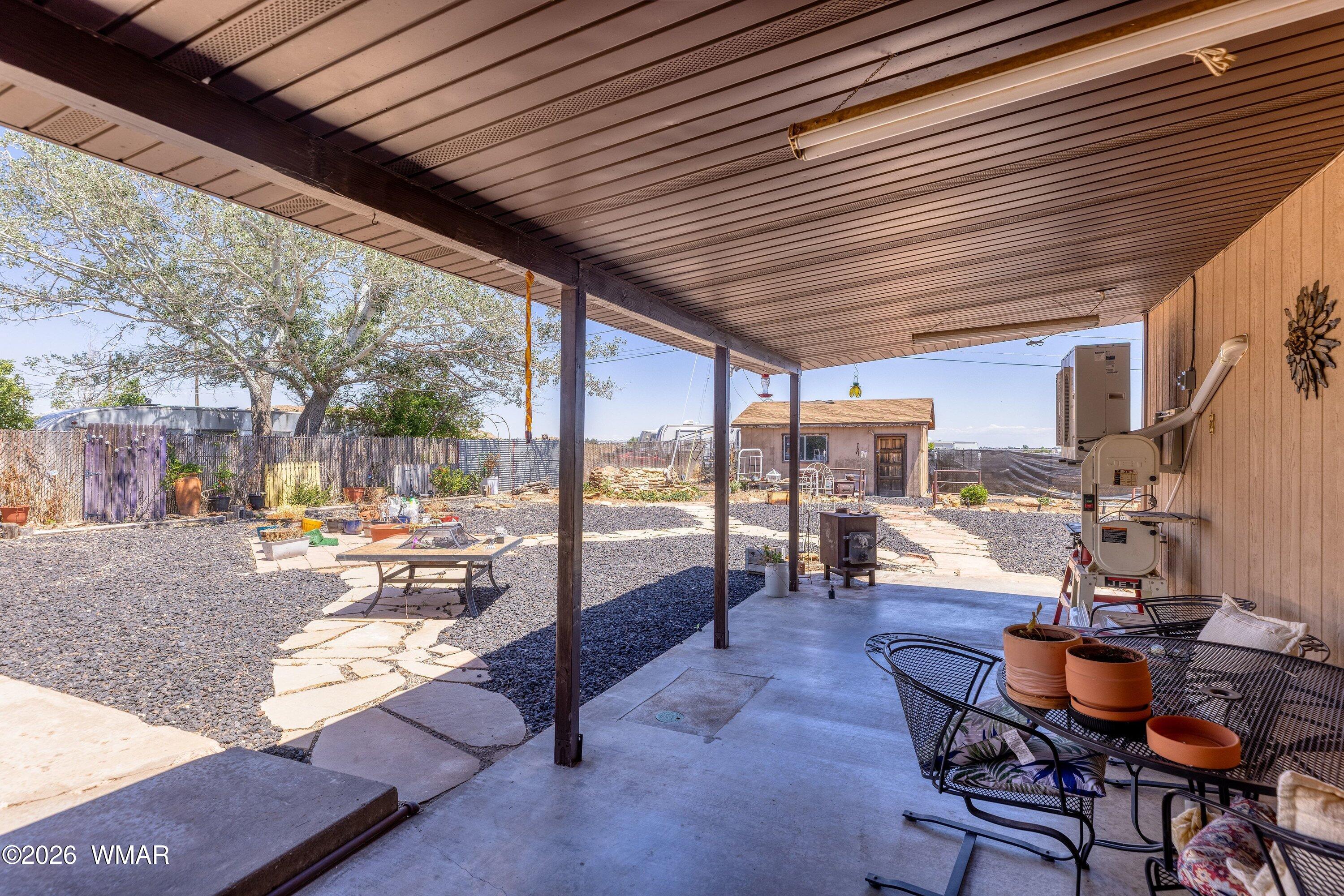 1114 Ranch Road Taylor, AZ 85939 - Photo 26 of 32 a outdoor space with chairs and couch