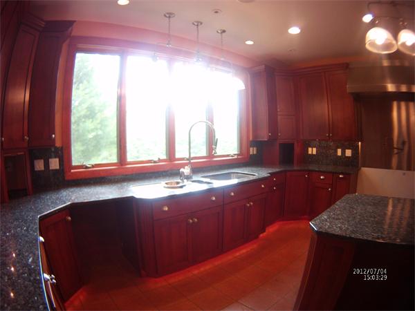 8 Burgess Point Road Wareham, MA 02571 - Photo 11 of 24 a kitchen with granite countertop sink and cabinets