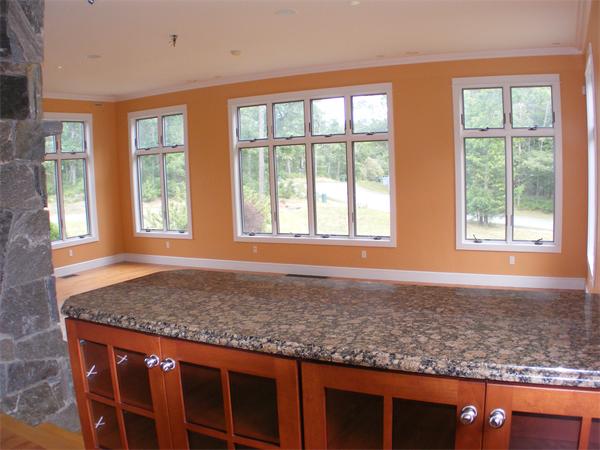 8 Burgess Point Road Wareham, MA 02571 - Photo 15 of 24 a view of a kitchen with granite countertop sink and cabinets