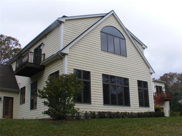 8 Burgess Point Road Wareham, MA 02571 - Photo 2 of 24 a front view of a house with a yard