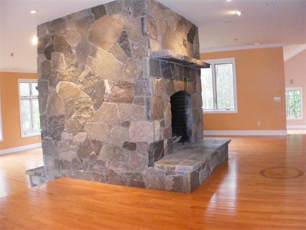 8 Burgess Point Road Wareham, MA 02571 - Photo 21 of 24 a living room with fireplace and a fireplace