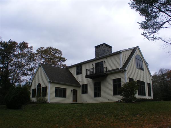 8 Burgess Point Road Wareham, MA 02571 - Photo 3 of 24 a front view of a house with a yard