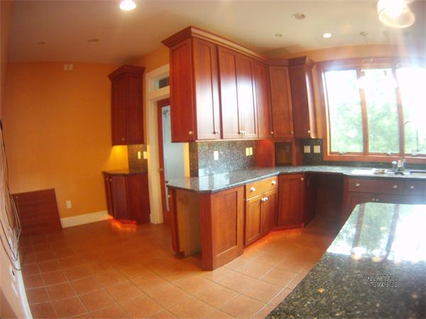 8 Burgess Point Road Wareham, MA 02571 - Photo 9 of 24 a kitchen with stainless steel appliances granite countertop a sink and a granite counter tops with a large window