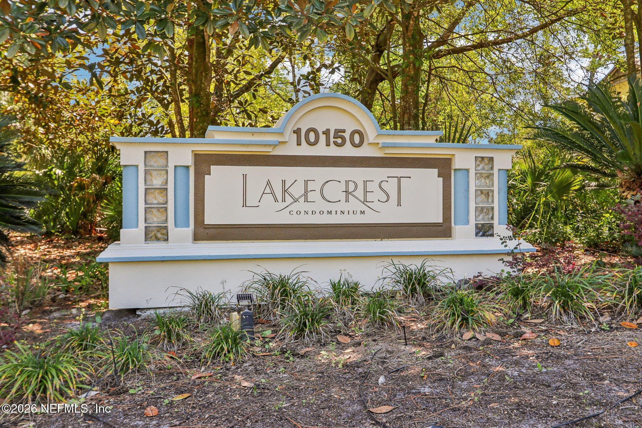 10150 Belle Rive Boulevard, Unit 102 Jacksonville, FL 32256 - Photo 2 of 33 a sign on the side of a building