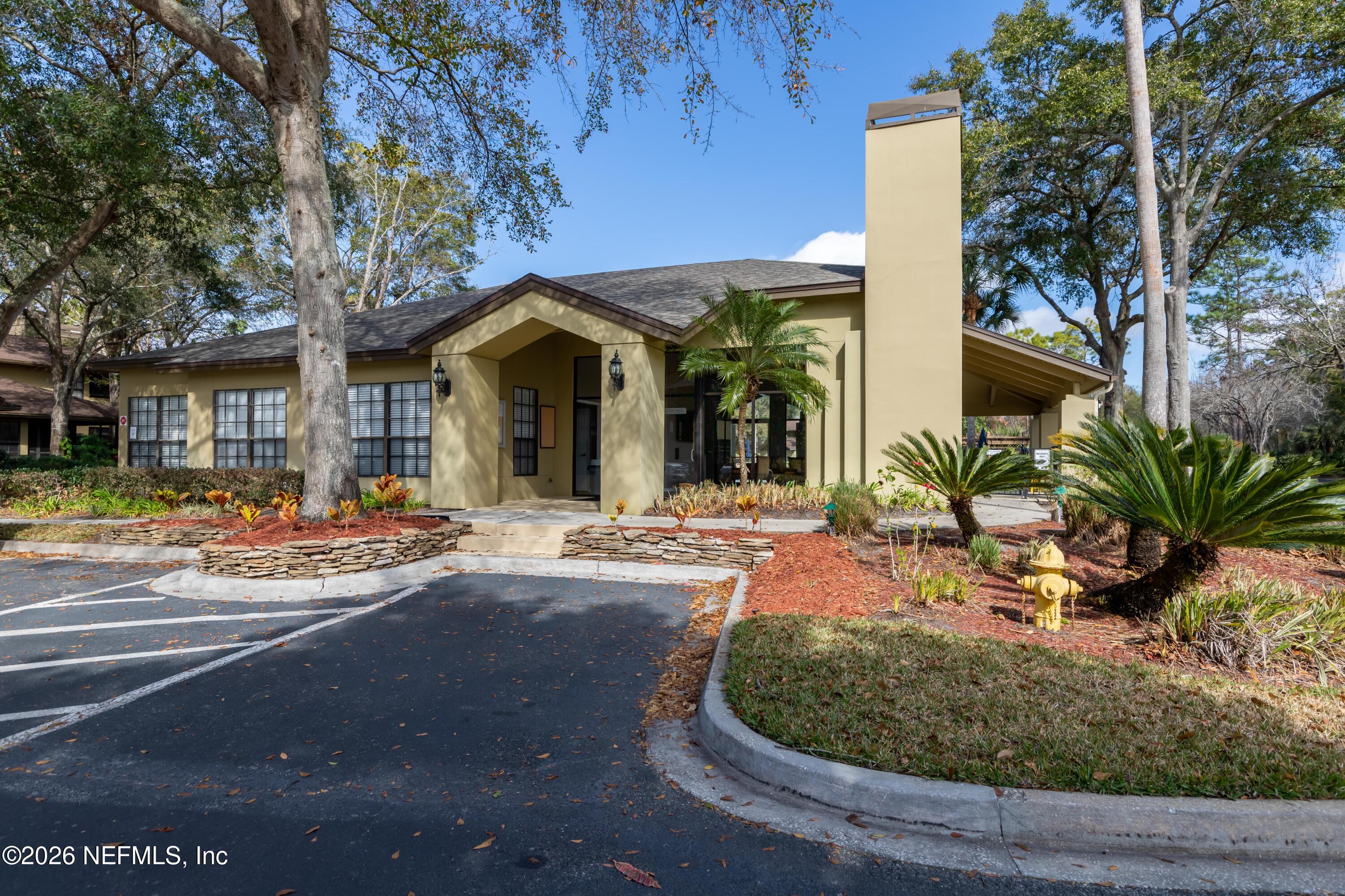 10150 Belle Rive Boulevard, Unit 102 Jacksonville, FL 32256 - Photo 26 of 33 a view of a house with entertaining space