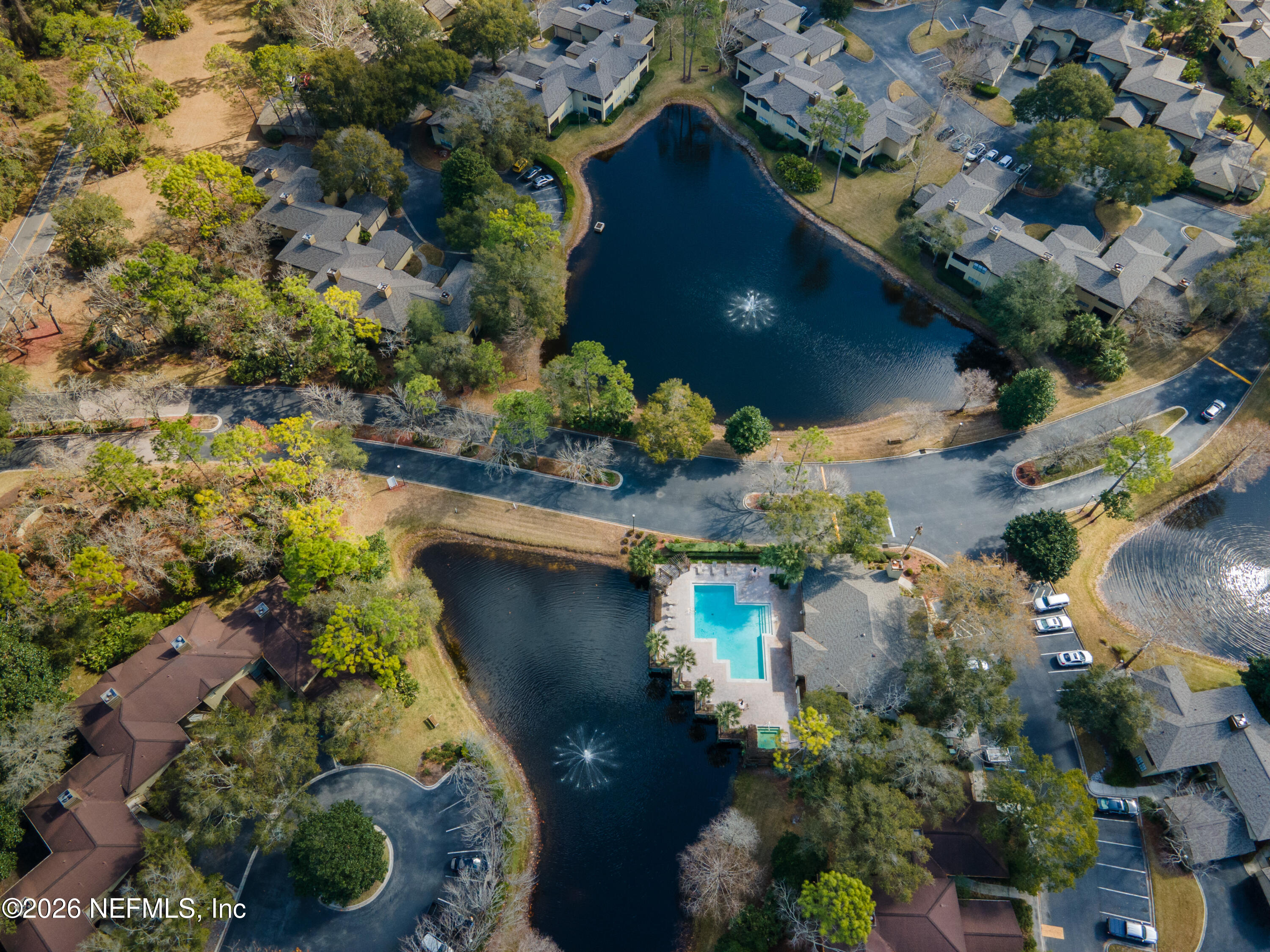 10150 Belle Rive Boulevard, Unit 102 Jacksonville, FL 32256 - Photo 31 of 33 an aerial view of a house with a yard
