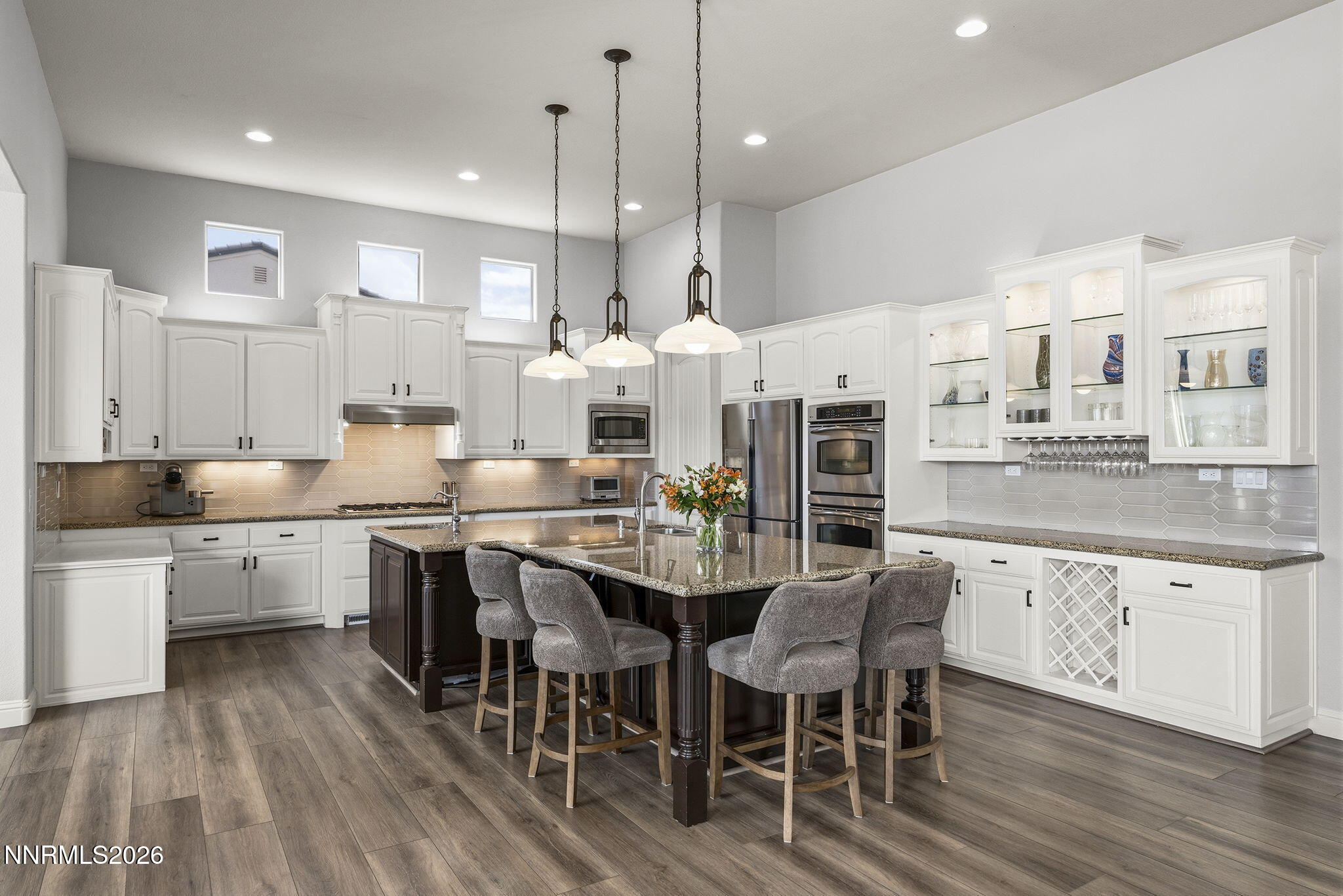 13340 Damonte View Lane Reno, NV 89511 - Photo 11 of 44 a large kitchen with a table and chairs