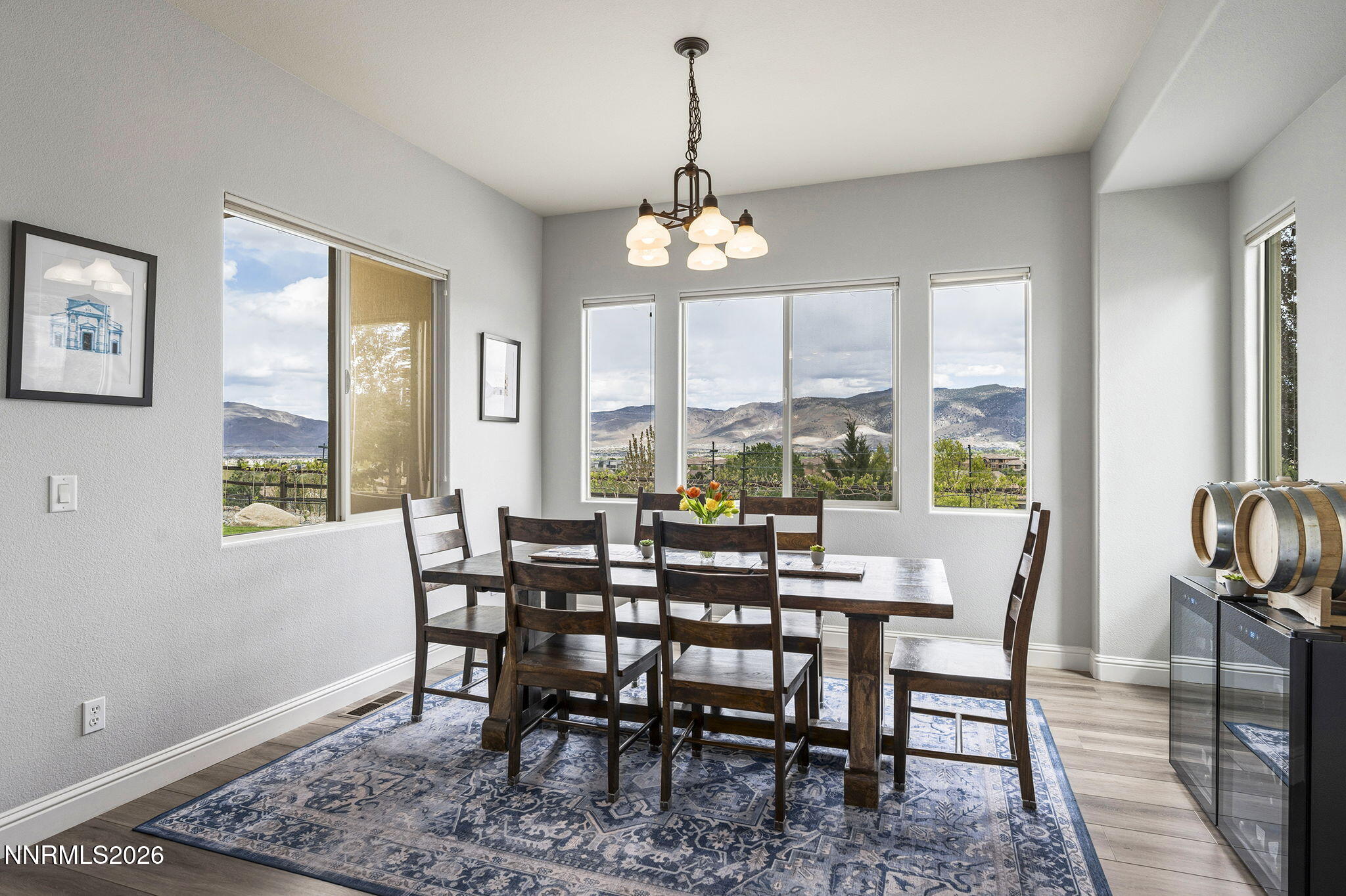 13340 Damonte View Lane Reno, NV 89511 - Photo 17 of 44 a view of a dining room with furniture window and wooden floor